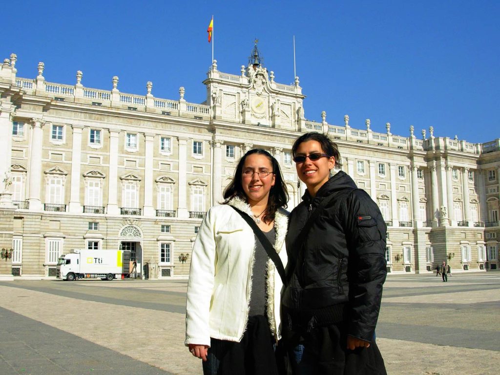 Standing with my sister in front of the Palacio Real in Madrid. We were following our dream of travel to backpack Western Europe.