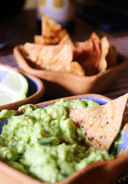 A close up of the delicious homemade guacamole and tortilla chips we enjoyed in Restaurant Guzzi.