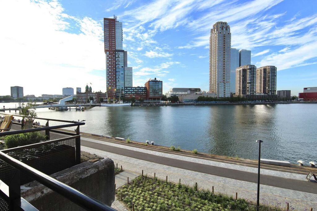 The beautiful city and water view from the Bed Bites & Business Hotel, one of the best Rotterdam hotels with terrace.