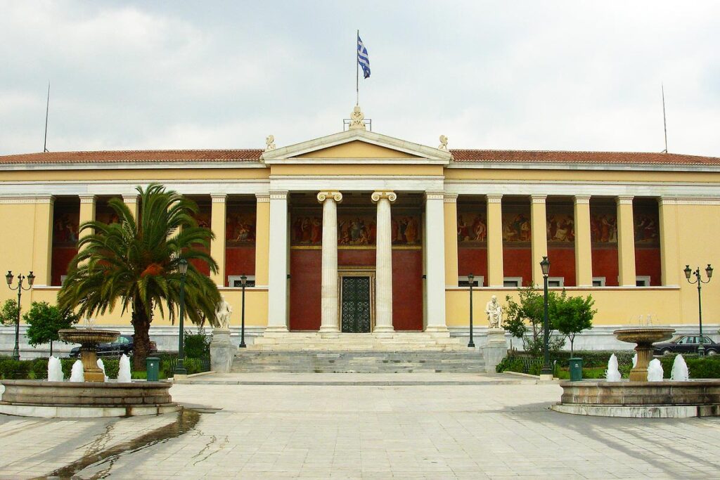 A view of the National Archaeological Museum, one of the cant miss attractions in Athens. This yellow and red building is very commanding with tall white columns near the entrance.