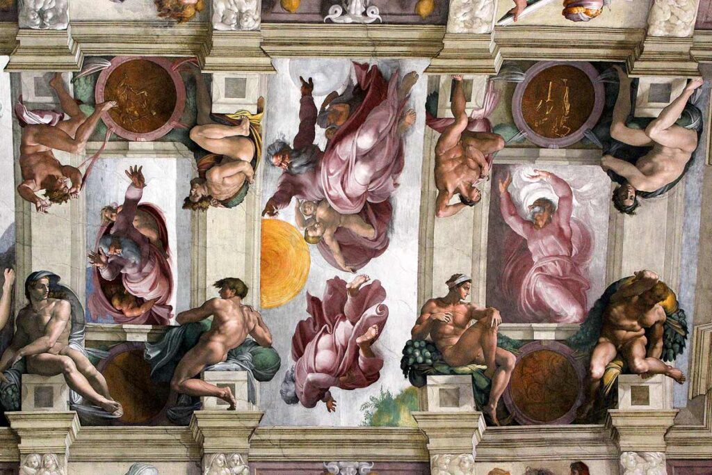 A portion of the Sistine Chapel in the Vatican, one of the best things to see with limited mobility. The paintings show naked male figures sitting on columns and female figures with delicate pink clothing.