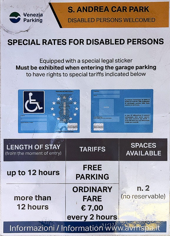 The disabled parking instructions at the San Andrea garage showing the need to present a wheelchair card to the attendant so receive free parking for 12 hours, an excellent choice for an accessible day trip to Venice.